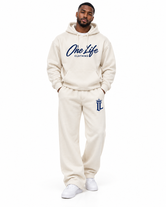 Male front view of the Cream ON GO smooth heavyweight hoodie and matching pants