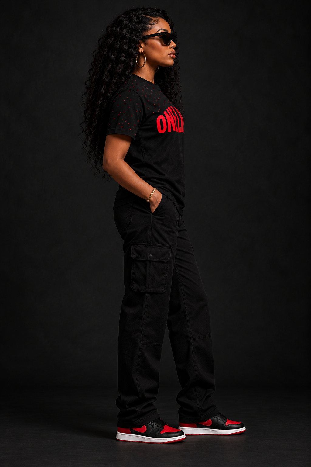 Women's model wearing the After Hours Tee by One Life Clothing — side view.