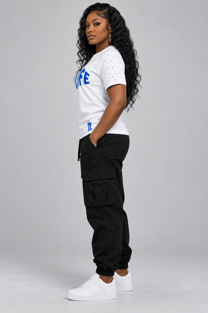 Women’s model wearing the Blue Blood Tee — side view.