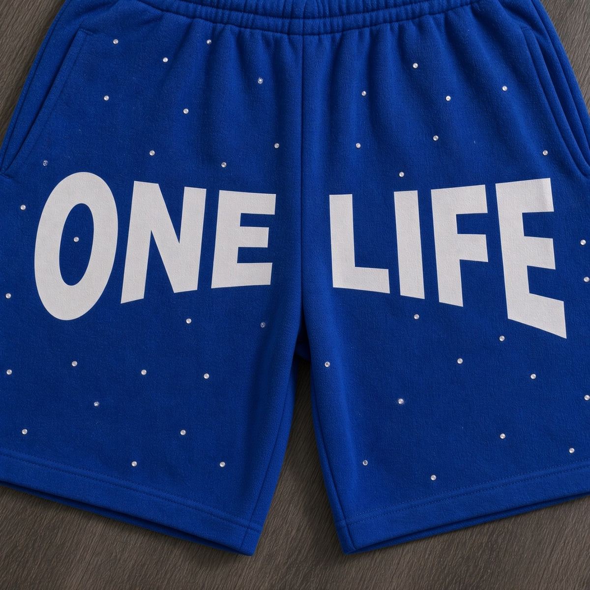 Blue Magic Shorts by One Life Clothing - front close-up