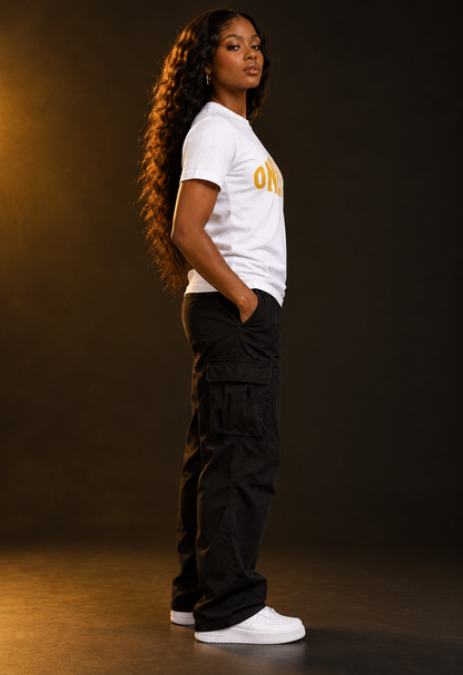 Women's model wearing the Crown Jewel Tee by One Life Clothing — side view.