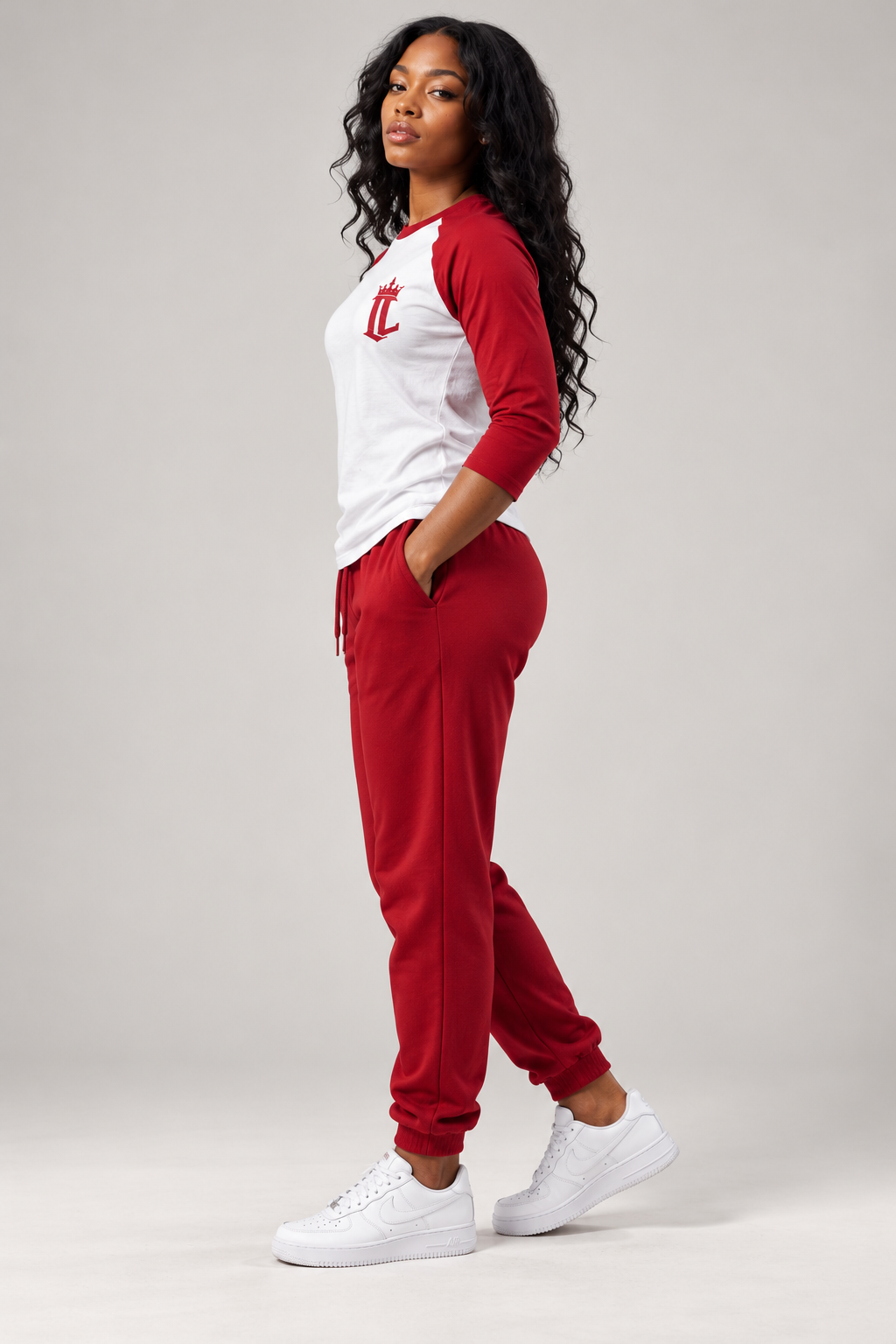 Women's model wearing Defining Moment Baseball Tee — side view