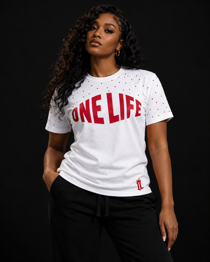 Women's model wearing the Ignition Tee by One Life Clothing — front view.
