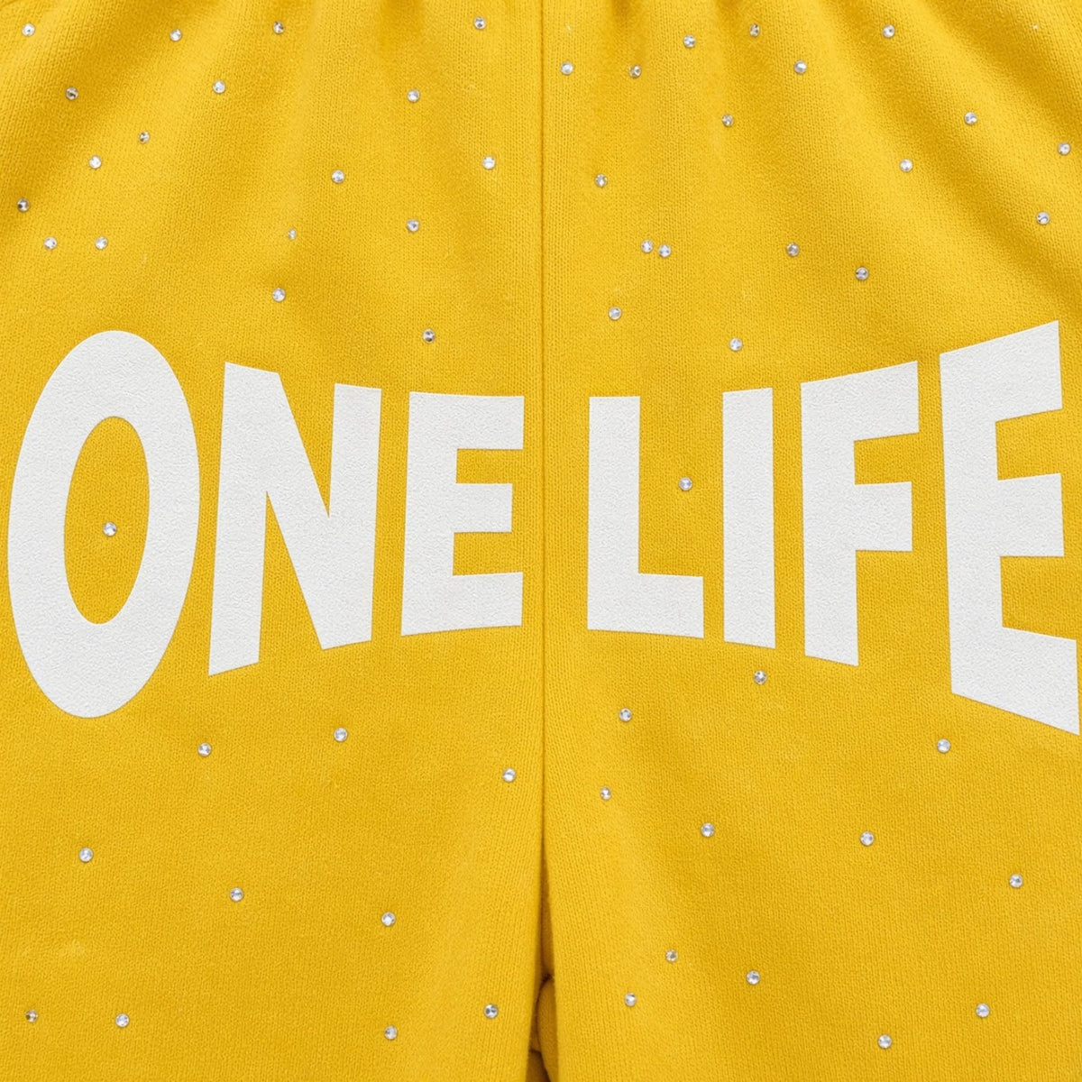 Lemon Pepper Shorts by One Life Clothing - front logo and rhinestone detail