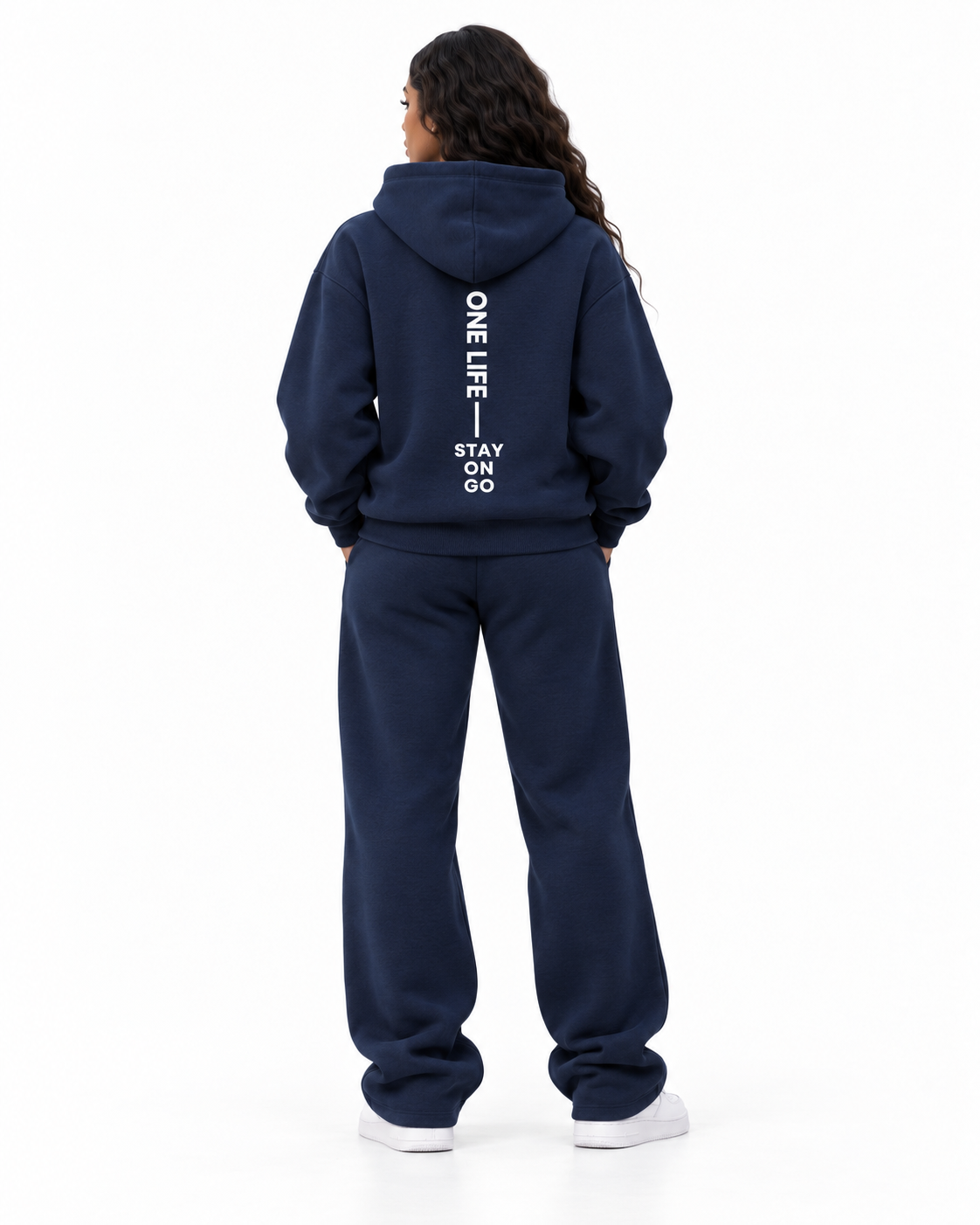 Female back view of the Navy ON GO smooth heavyweight hoodie and matching pants