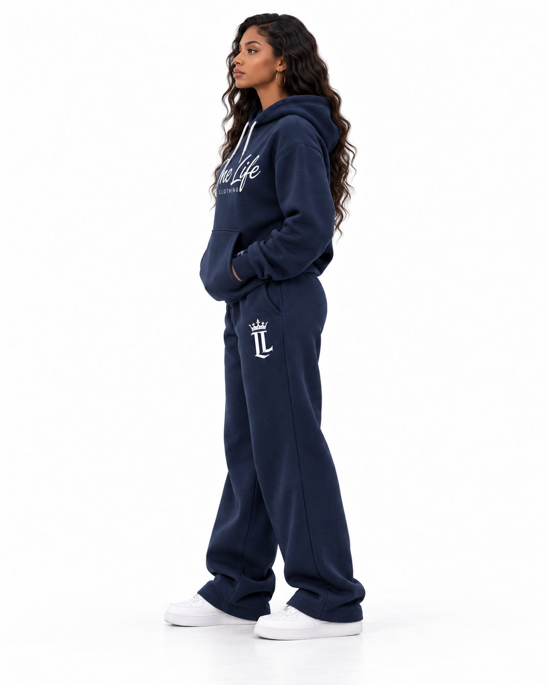 Female side view of the Navy ON GO smooth heavyweight hoodie and matching pants