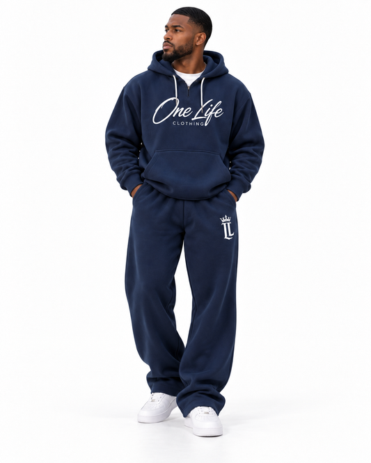 Male front view of the Navy ON GO smooth heavyweight hoodie and matching pants