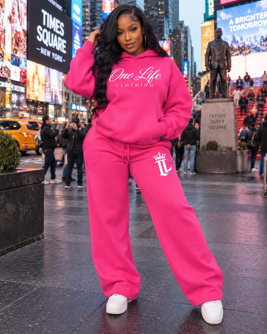 Women's pink ON GO set styled in Times Square