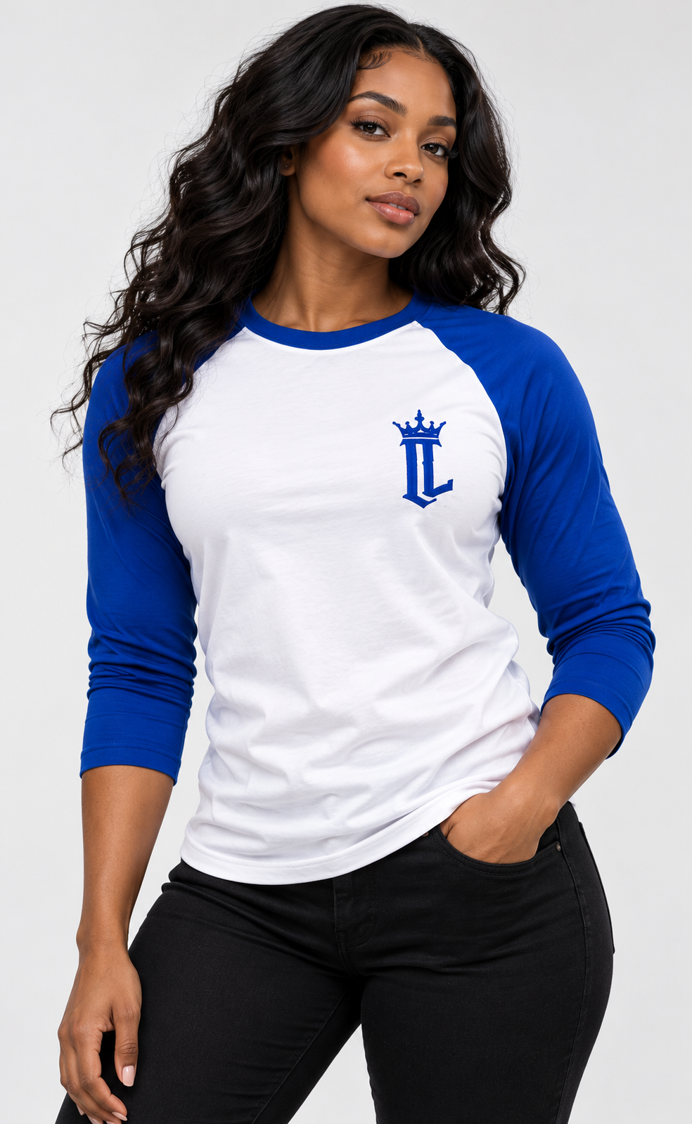 Women's model wearing the Resolve Baseball Tee by One Life Clothing — front view.